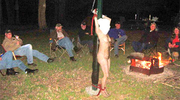 Fun for hunters while spending the night in the forest. The bound girl was tormented and then fucked by all together